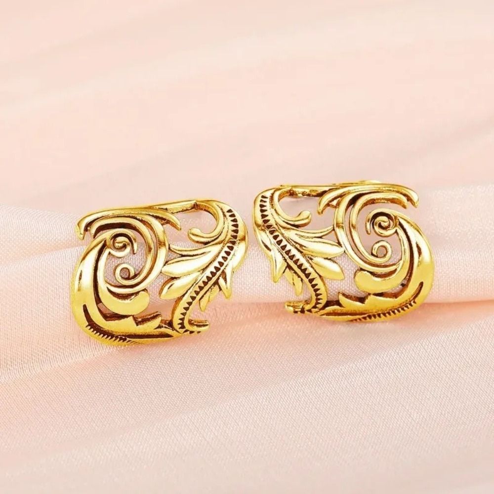 Orecchini a Clip in Rame con M - Ethnic Fashion Wear For Women recensione e prezzo